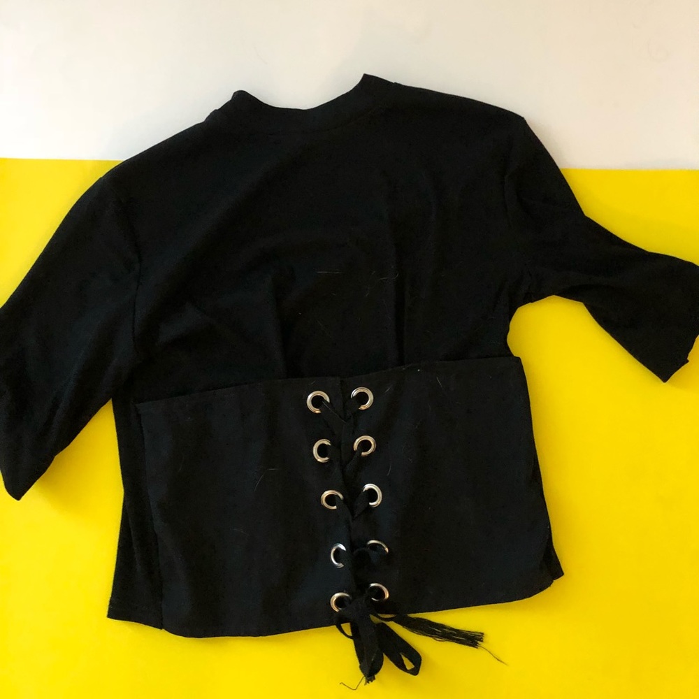 Black top with eyelet details